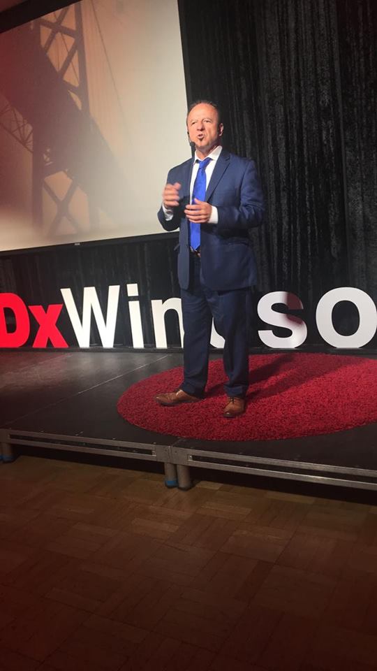 Hypnotist James Graham onstage at Windsor Ontario TedX event